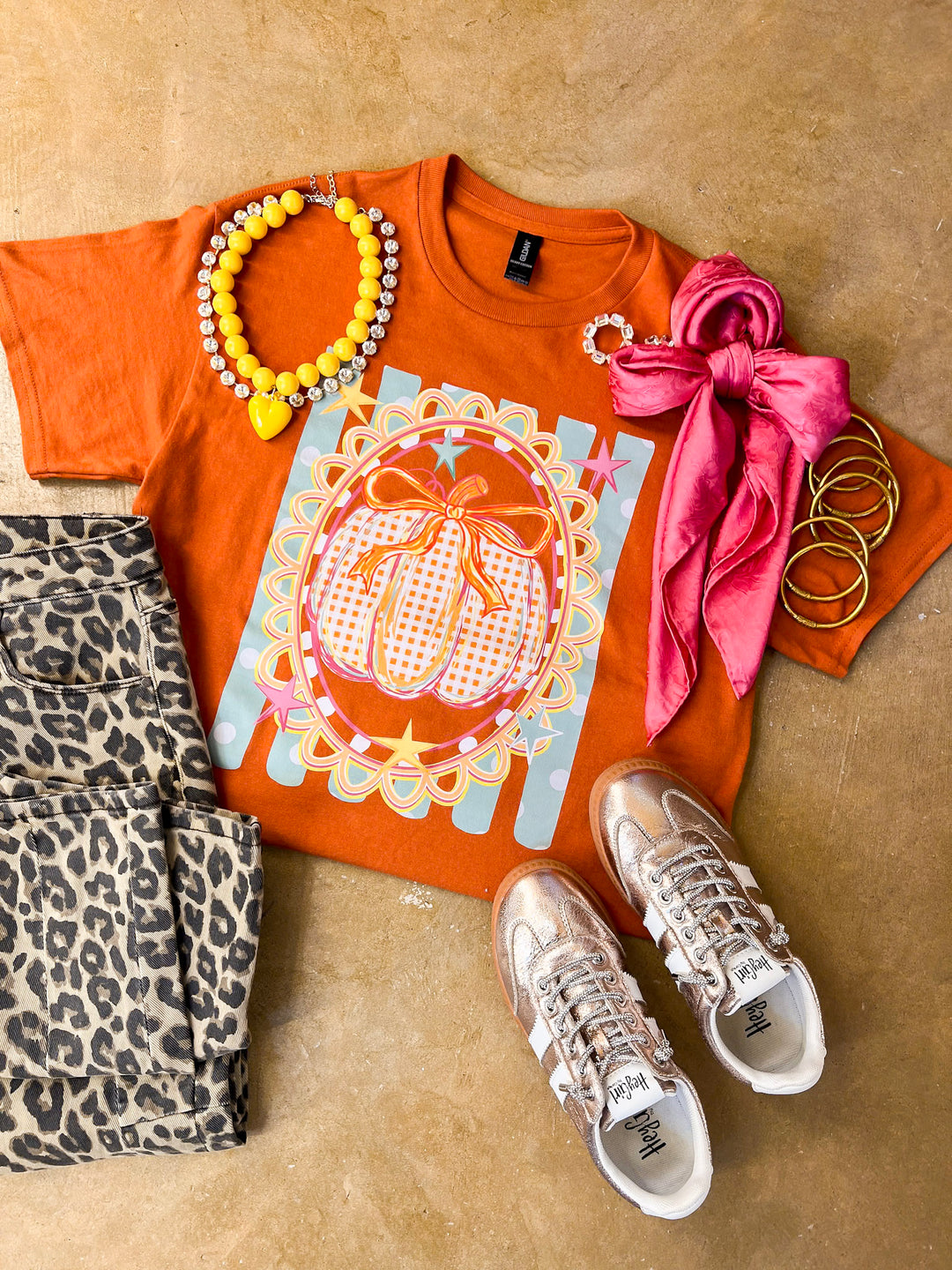 Sweet on the Season Gingham Pumpkin, Stripe and Polka Dot Design with Bow Detail Fall Graphic Tee in Rust Orange