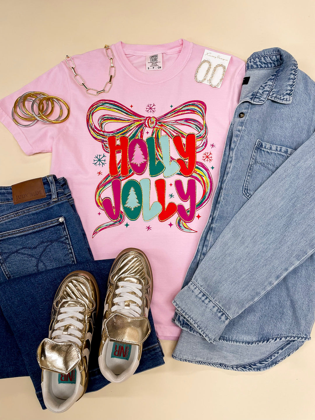 Last Chance Size 3XL | Holly Jolly Colorful Bow Christmas Graphic on Short Sleeve Comfort Color Tee in Pink - Giddy Up Glamour Boutique