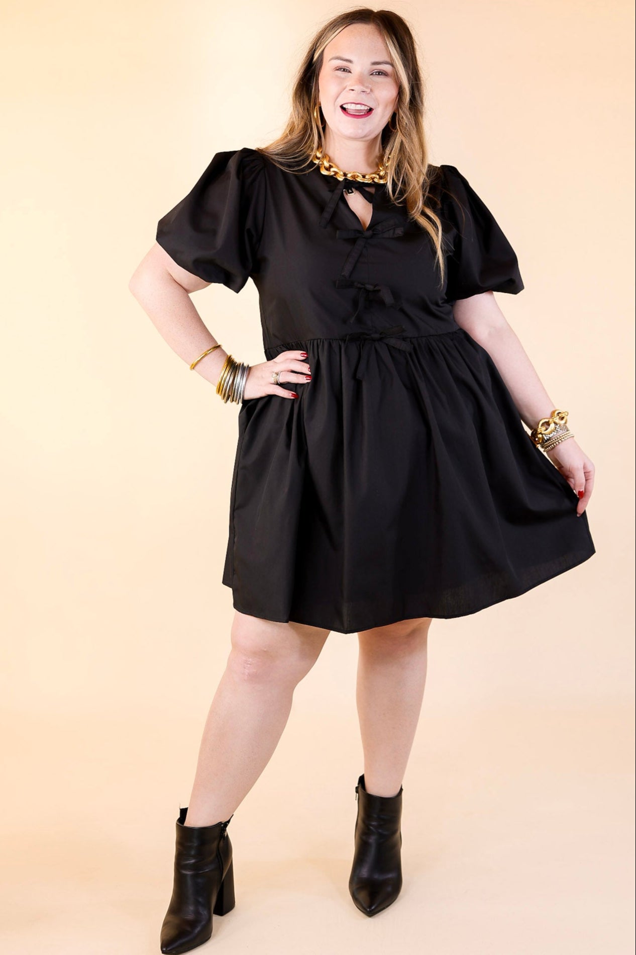 Short and Sweet Dress with Short Puff Sleeves and Bows in Black