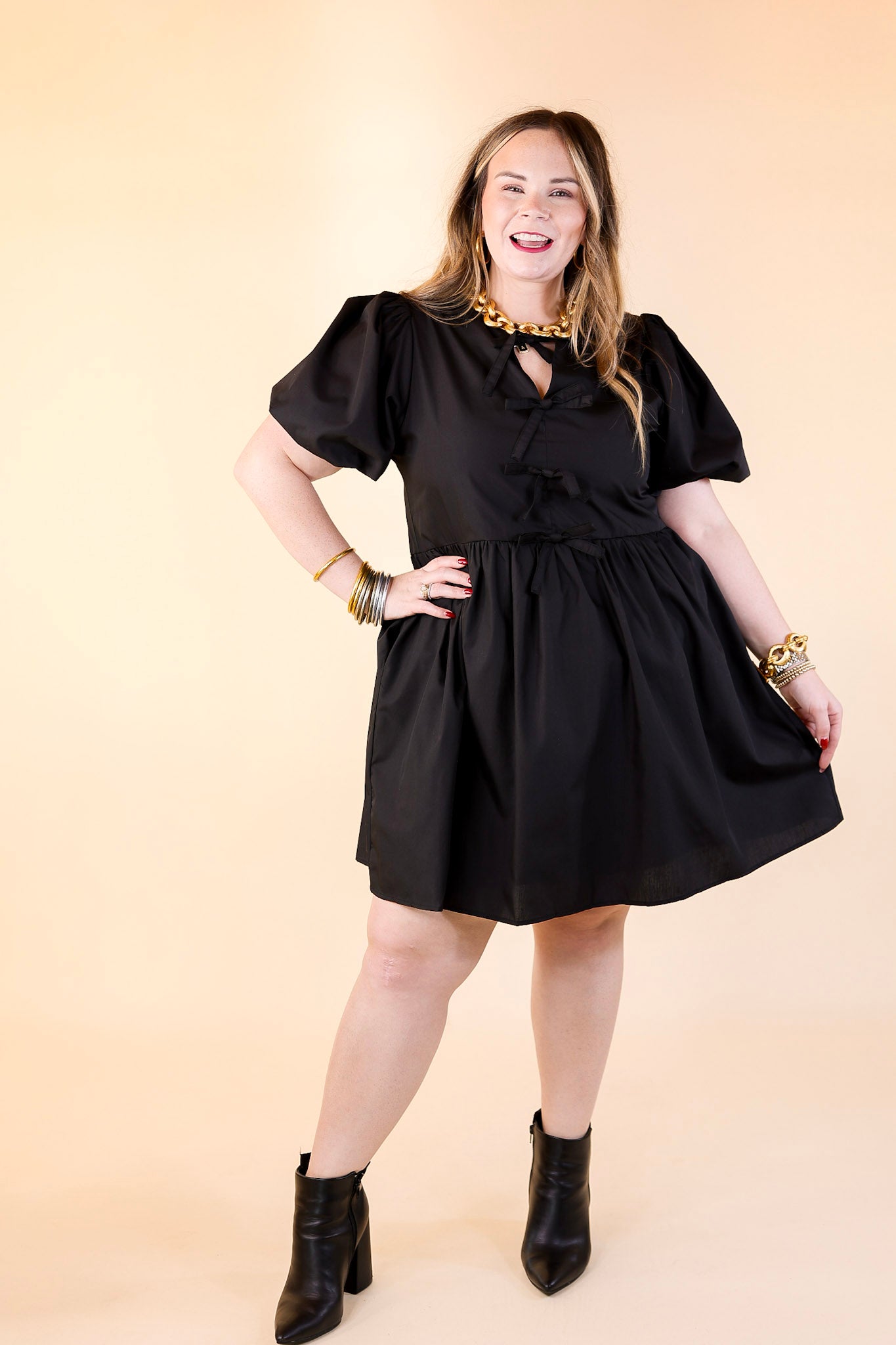 Short and Sweet Dress with Short Puff Sleeves and Bows in Black