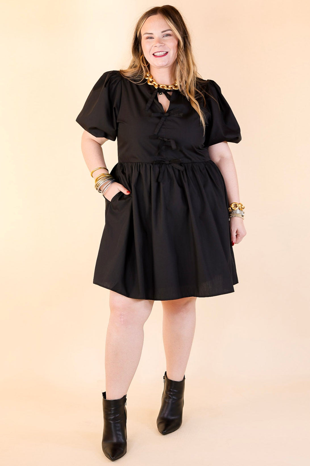 Short and Sweet Dress with Short Puff Sleeves and Bows in Black