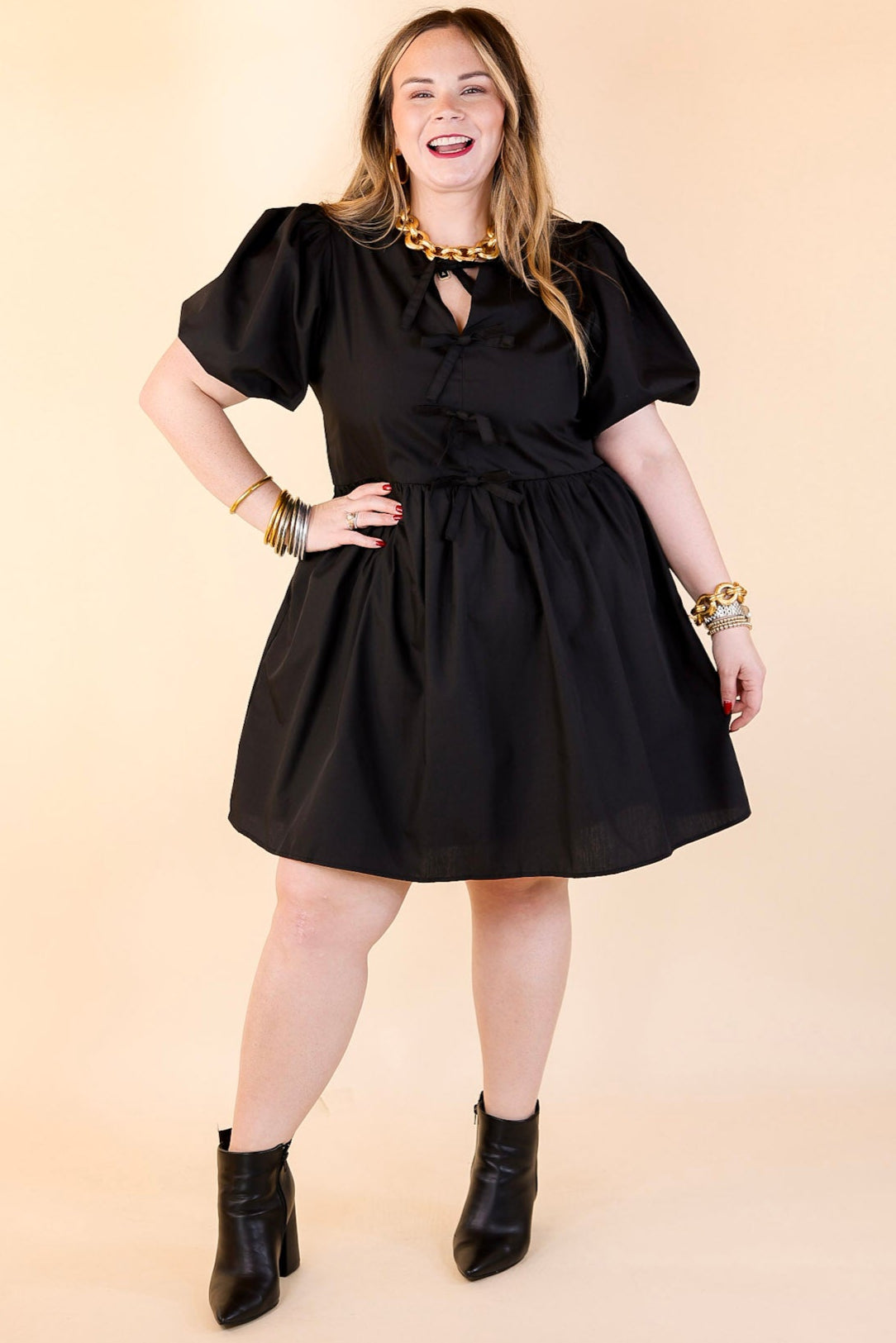 Short and Sweet Dress with Short Puff Sleeves and Bows in Black