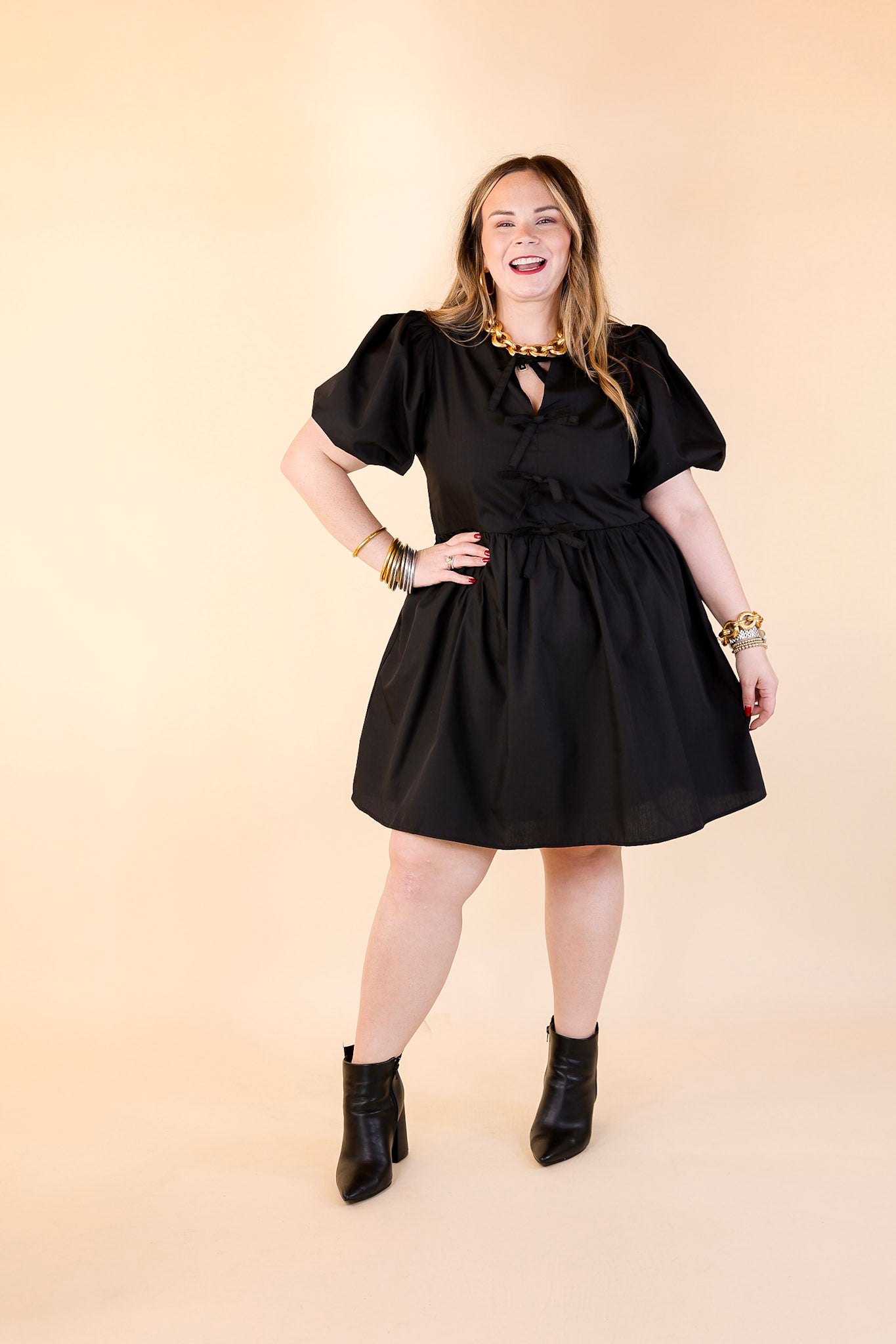 Short and Sweet Dress with Short Puff Sleeves and Bows in Black