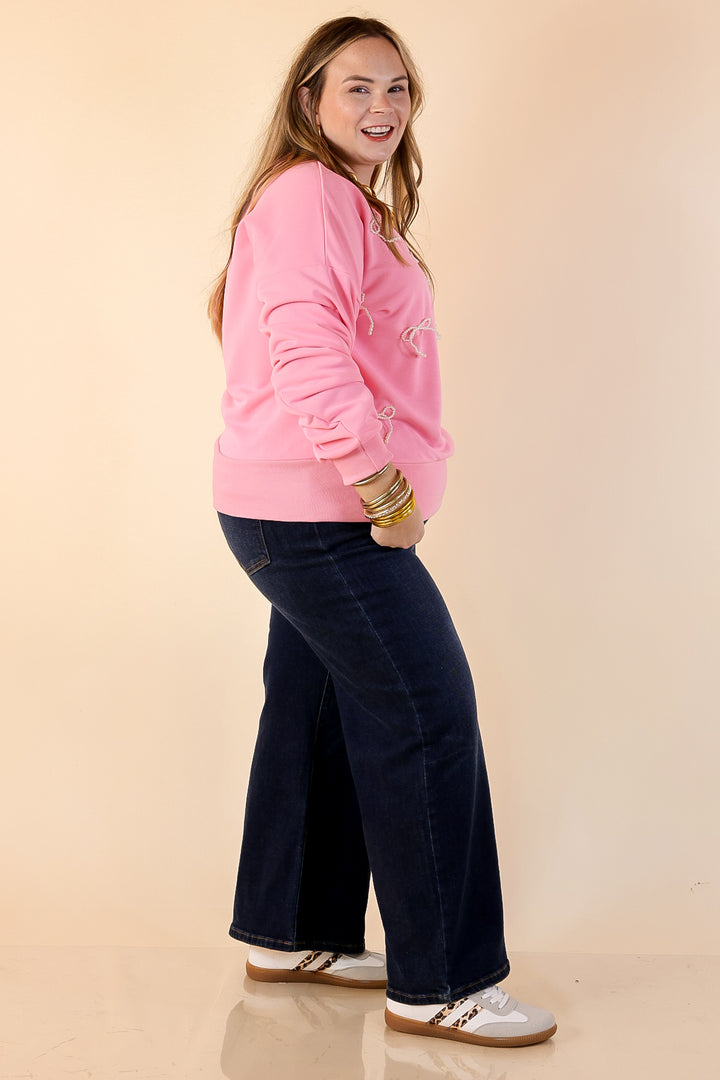 All Tied Up Pearl Bow Detail Long Sleeve Top with Scattered Bow Accents in Pink