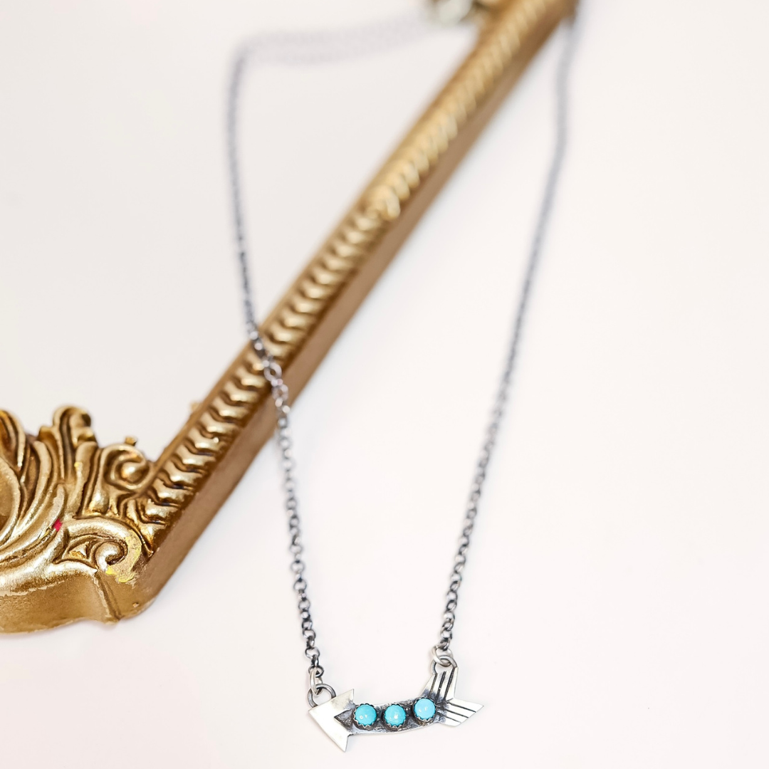 Necklace with turquoise stones on a white background