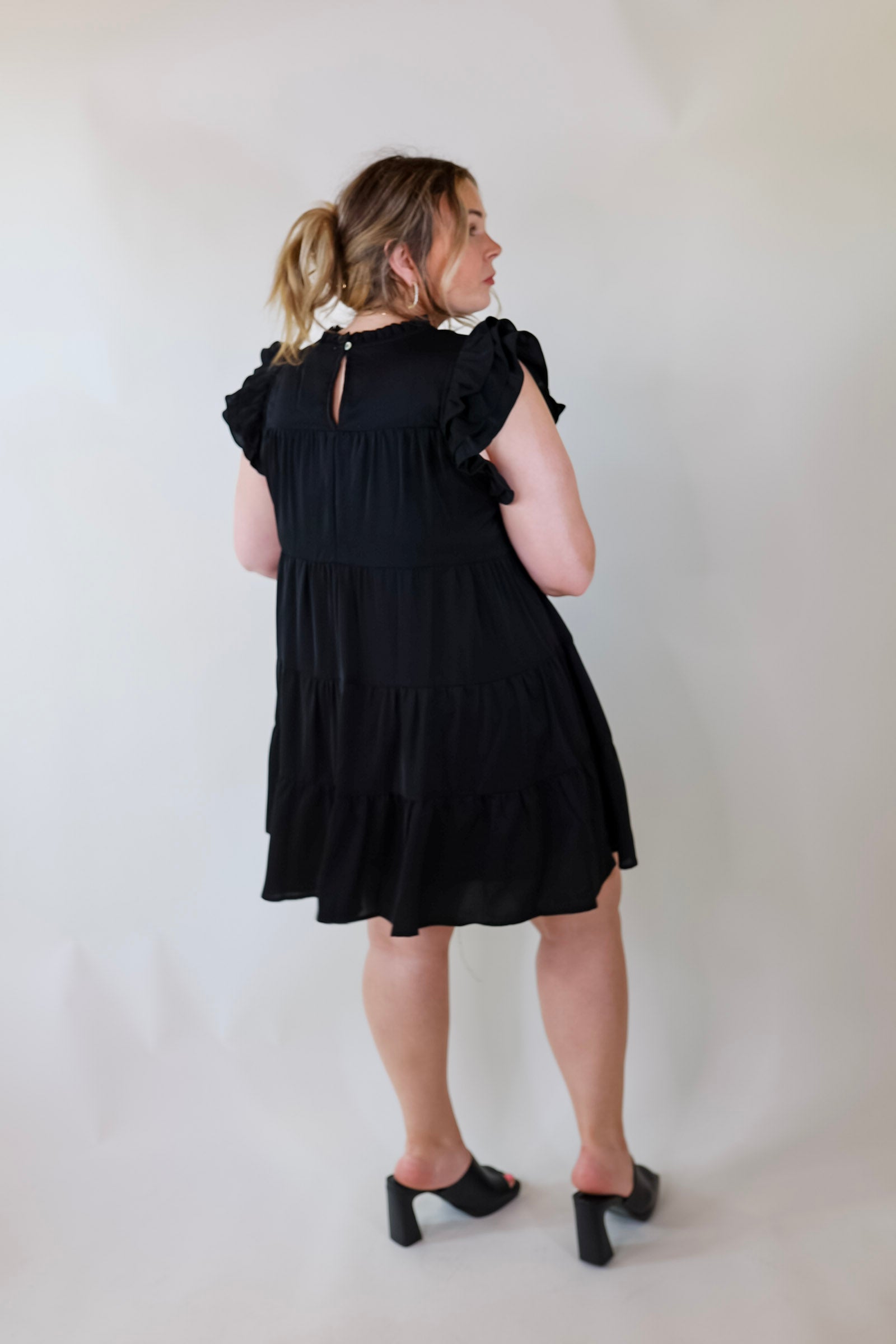 Chic On Scene Ruffle Tiered Dress with Pleated Detailing in Black - Giddy Up Glamour Boutique