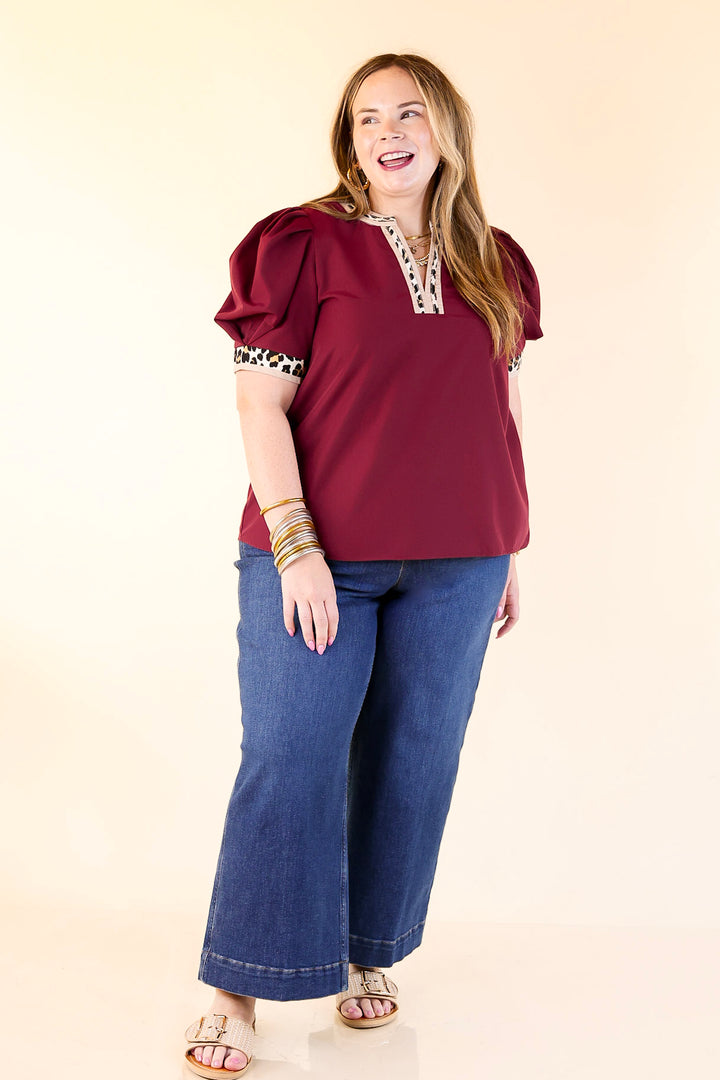 Standout Style V Neck Top with Short Balloon Sleeves and Leopard Print Trim in Maroon