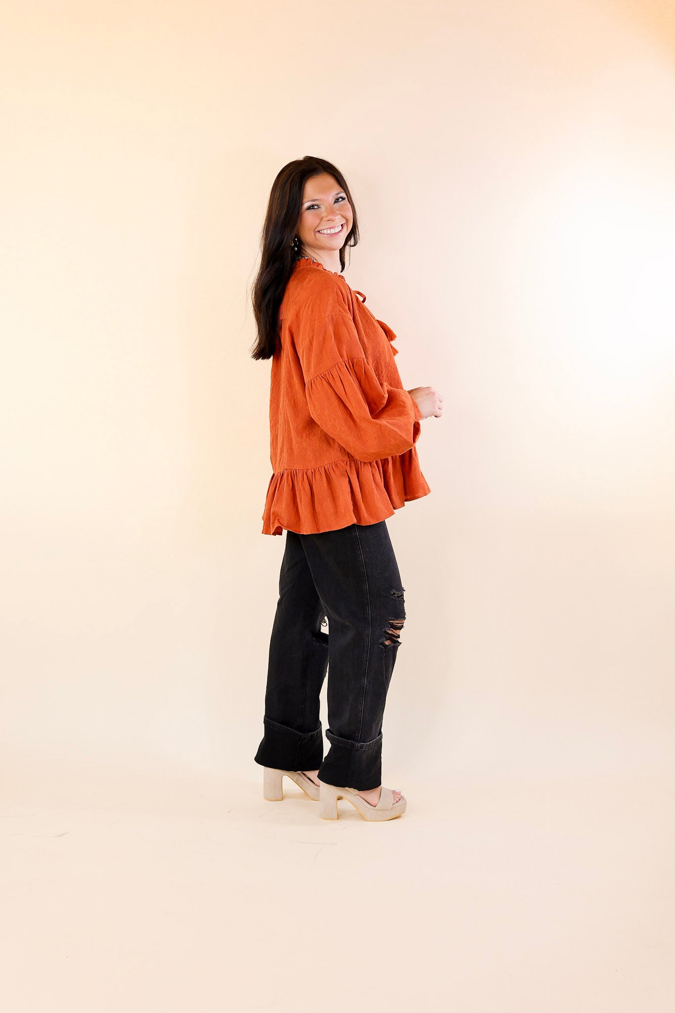 Free Fallin' Textured Long Sleeve Peplum Top with Keyhole Front in Orange