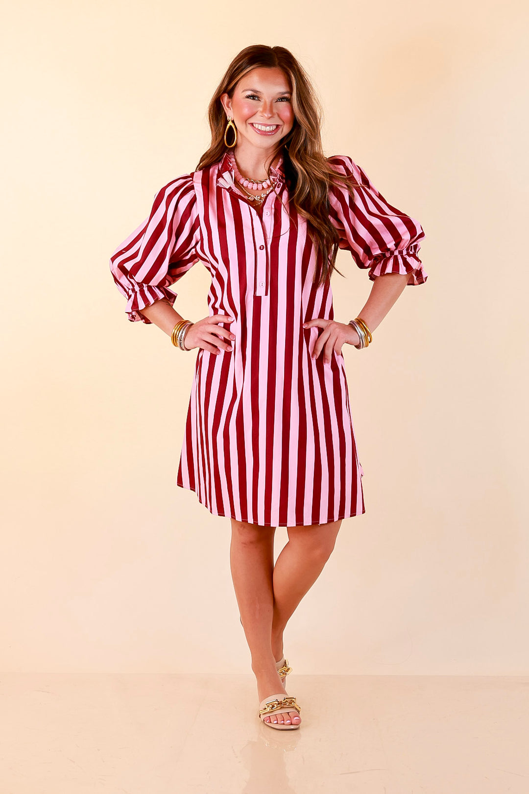 Talk of the Town Striped Ruffle Sleeve Babydoll Dress with Cinched Waist Feature in Maroon and Pink