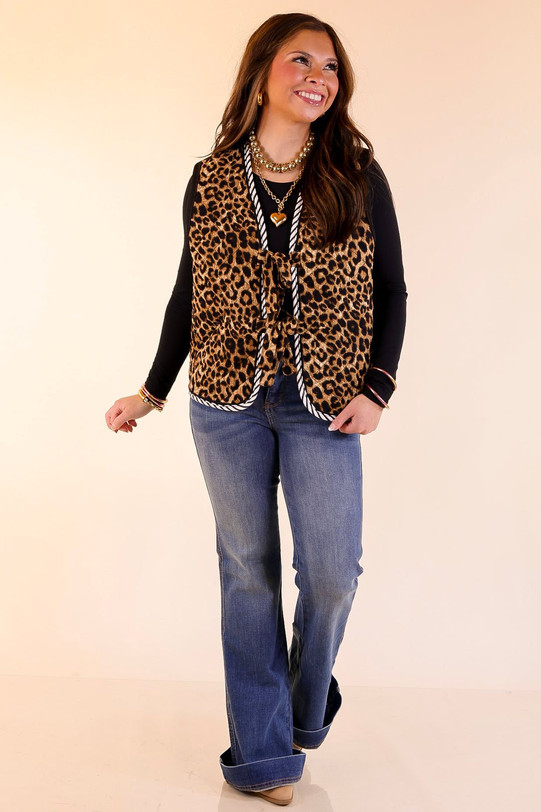 Wildly Chic Quilted Puffer Vest with Stripe Trim and Black Piping in Leopard Print