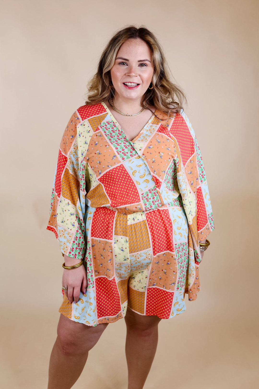 Pushing Limits Floral Patch Print Romper with 3/4 Sleeves - Giddy Up Glamour Boutique