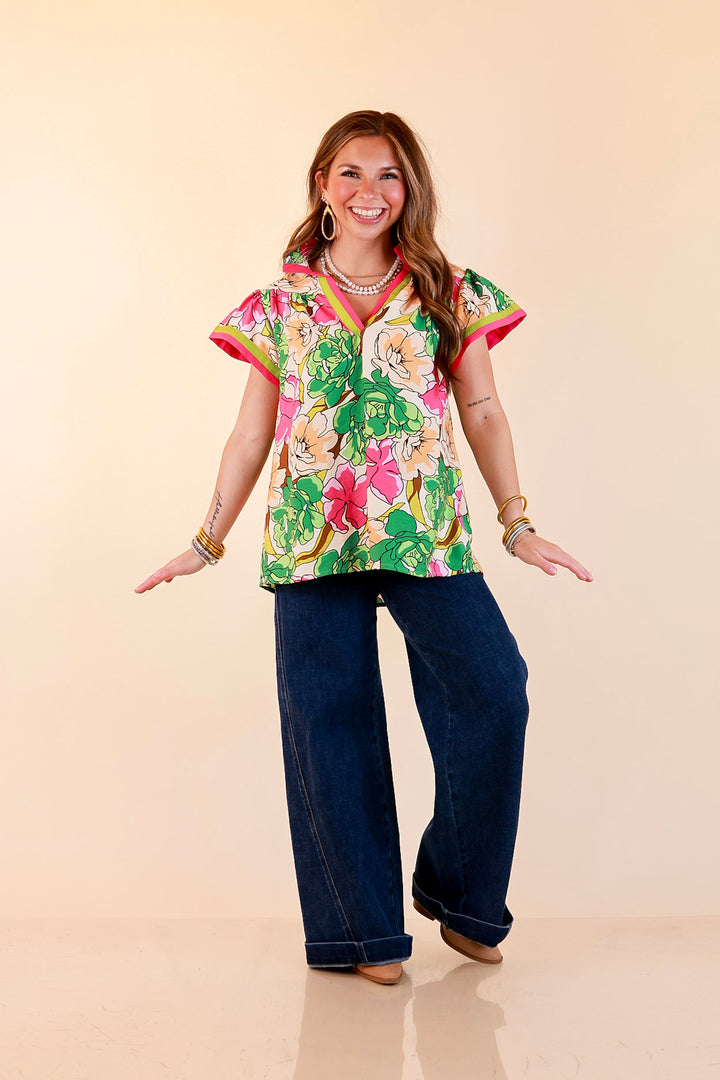 Spring Symphony Floral Print Flutter Sleeve Top with Contrast Trim Split Neckline in Pink and Green