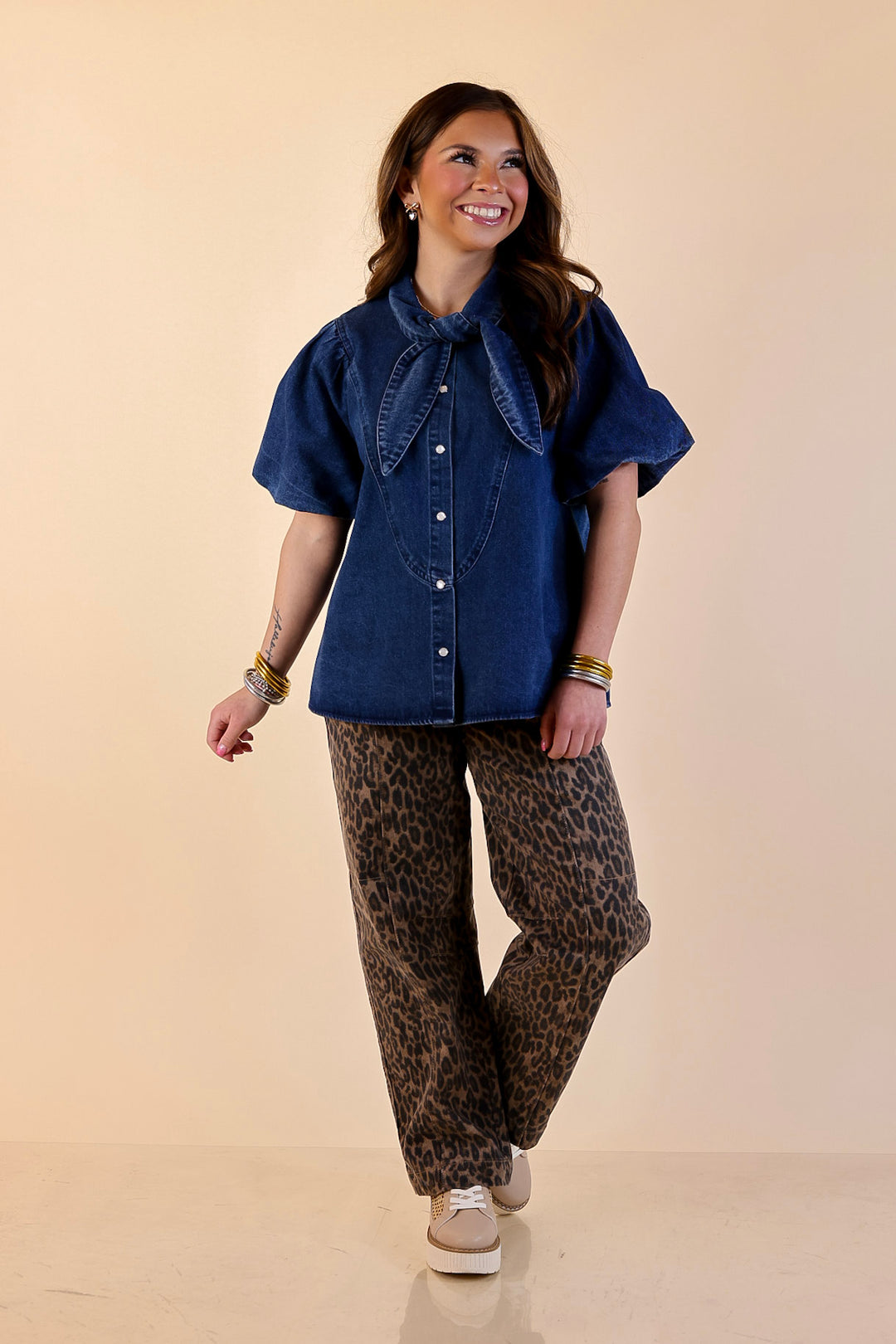 Tie the Moment Denim Pearl Snap Button Front Top with Statement Tie Neckline and Puff Sleeves in Medium Wash