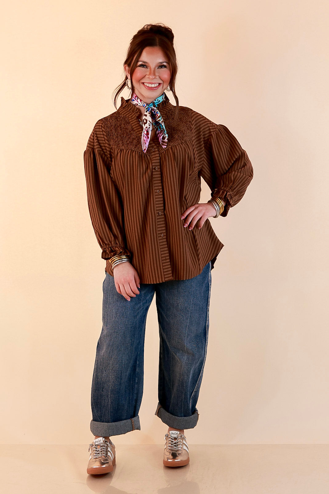 A Fine Line Smocked Ruffle Neck Long Sleeve Striped Button Front Blouse in Chocolate Brown