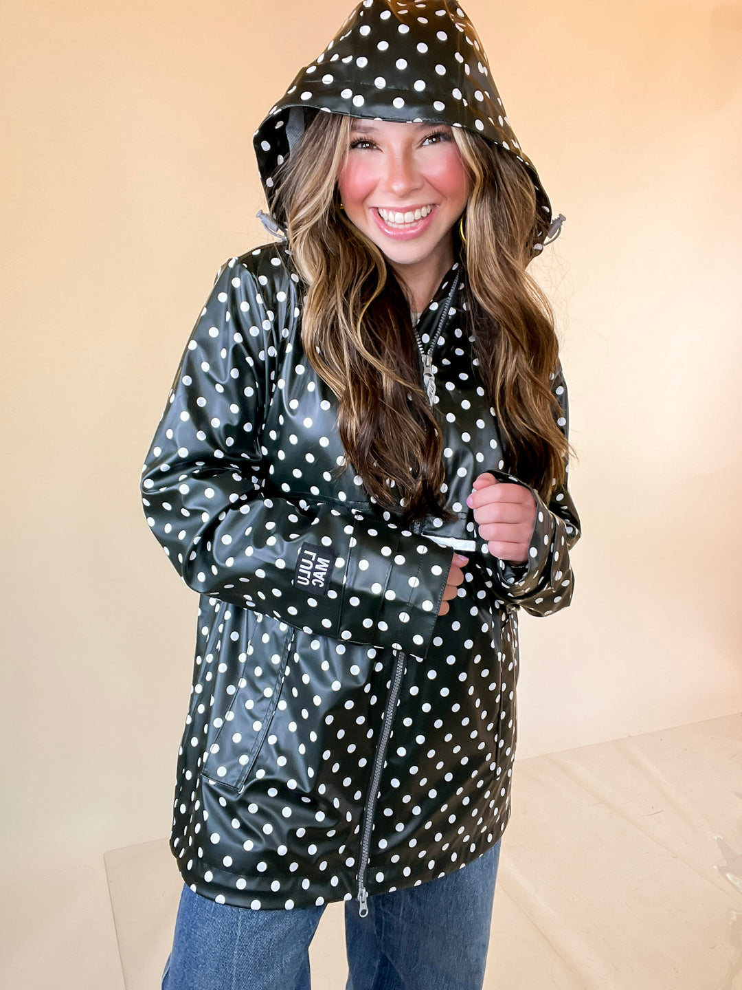 Lulu Mac | Chic Forecast Ivory Polka Dot Hooded Rain Jacket in Black