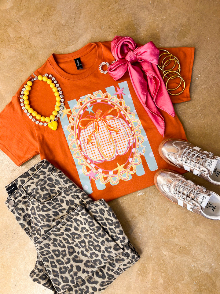 Sweet on the Season Gingham Pumpkin, Stripe and Polka Dot Design with Bow Detail Fall Graphic Tee in Rust Orange