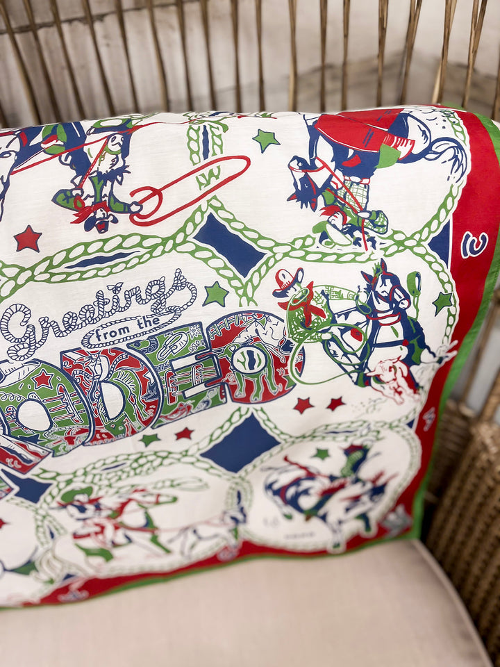 XOXO Art & Co | Greetings from the Rodeo Print Shorty Wild Rag Scarf in Ivory, Green, Red and Blue