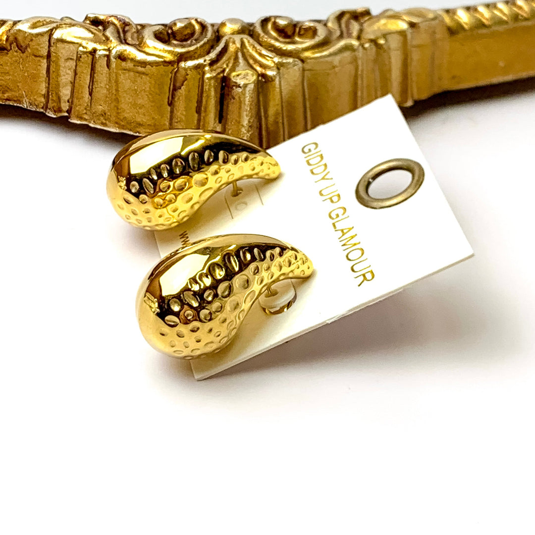 Bracha | Romy Hammered Drop Stud Earrings in Gold Tone - Giddy Up Glamour Boutique