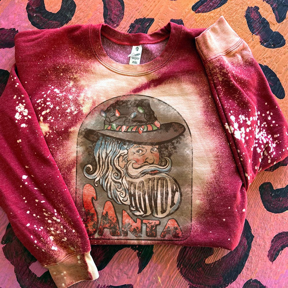 Online Exclusive | Howdy Western Santa Christmas Long Sleeve Graphic Sweatshirt in Splatter Bleach Red - Giddy Up Glamour Boutique