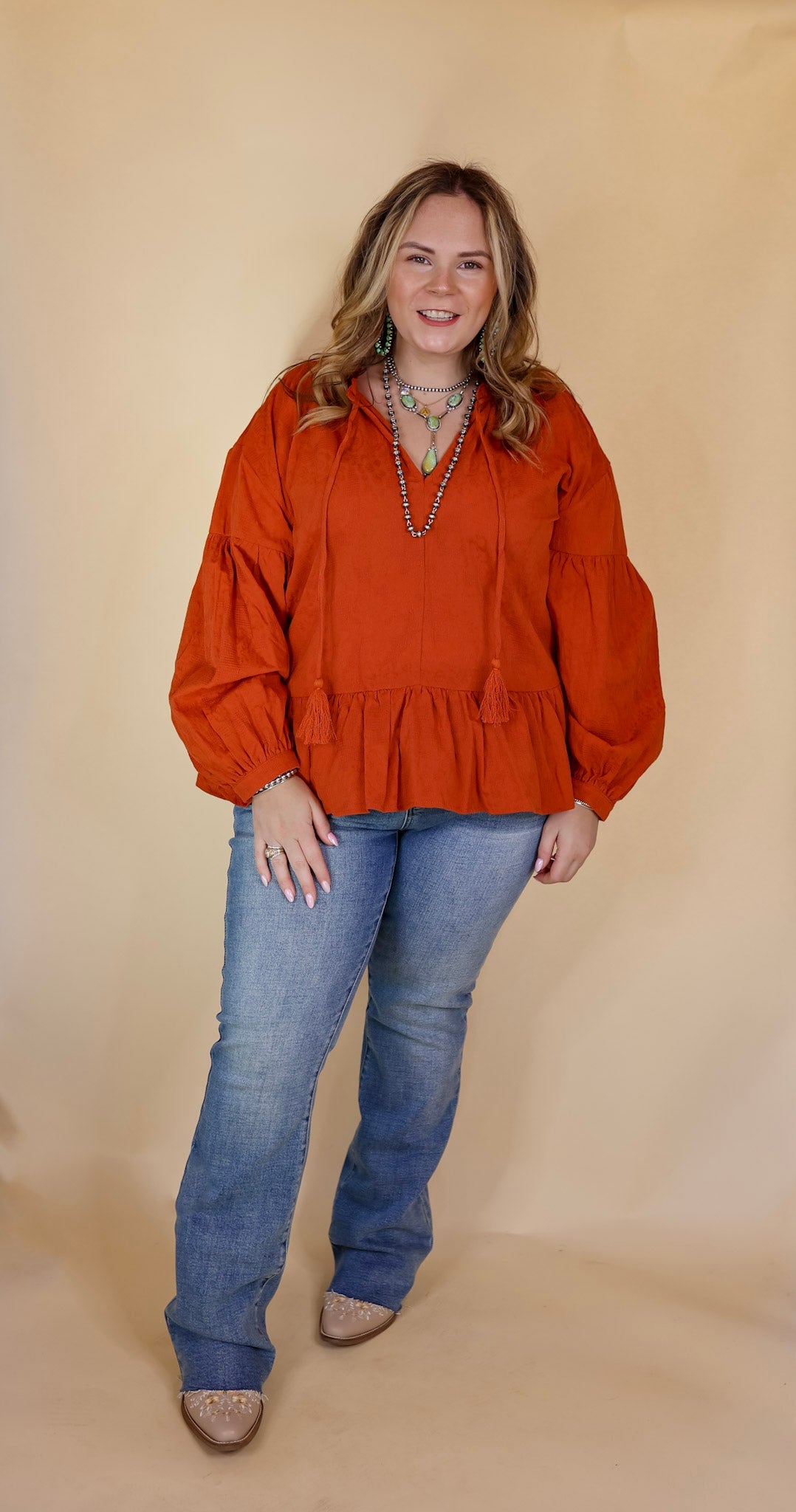 Free Fallin' Textured Long Sleeve Peplum Top with Keyhole Front in Orange