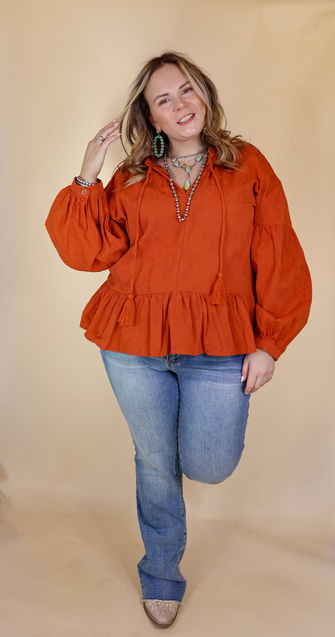Free Fallin' Textured Long Sleeve Peplum Top with Keyhole Front in Orange - Giddy Up Glamour Boutique