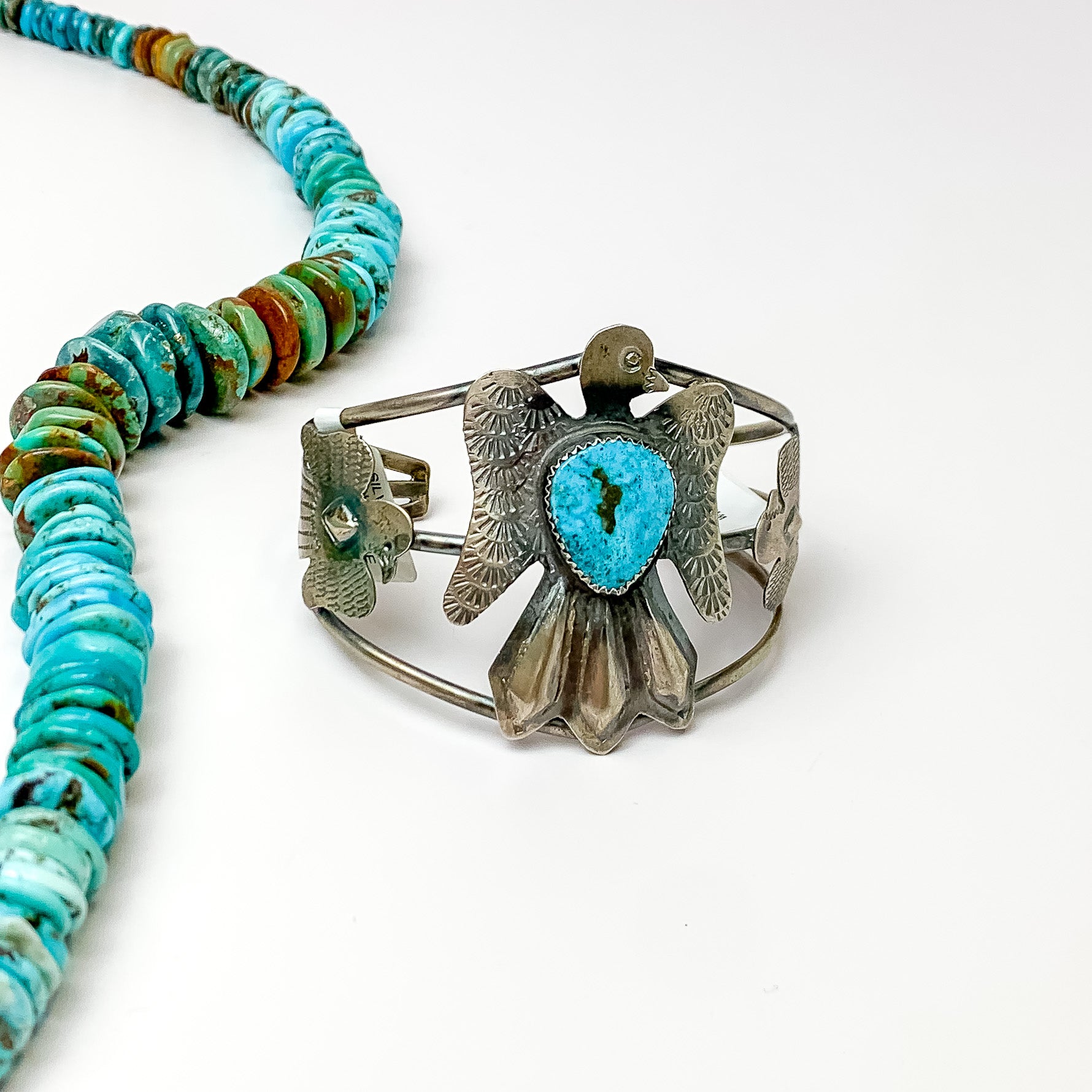 tim yazzie thunderbird sterling silver cuff bracelet with 3 birds topped with turquoise stone zuni navajo nations native american indian handmade handcrafted heritage style turquoise and co