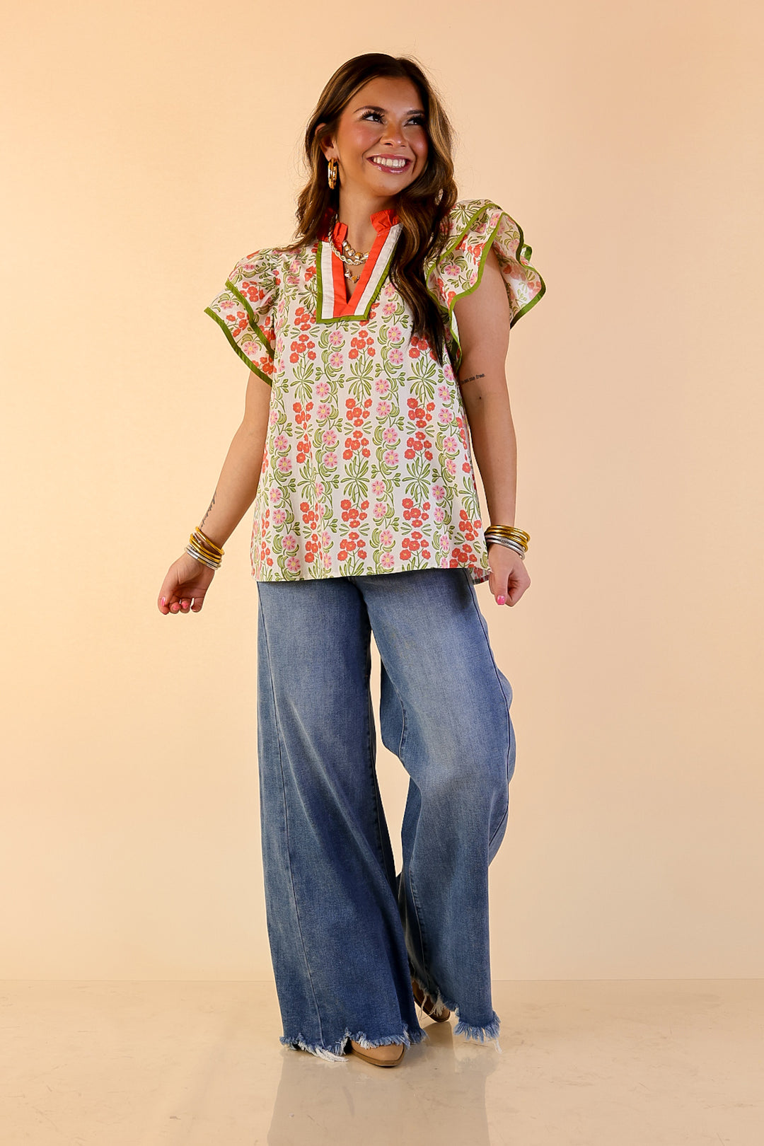 Blooming Outlook Floral Top with Ruffle Cap Sleeves and Contrast Trim Detail in Coral, Pink and Green