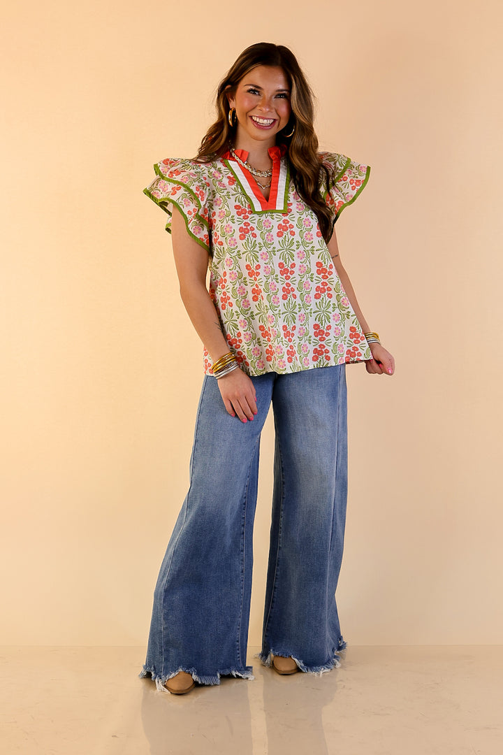 Blooming Outlook Floral Top with Ruffle Cap Sleeves and Contrast Trim Detail in Coral, Pink and Green