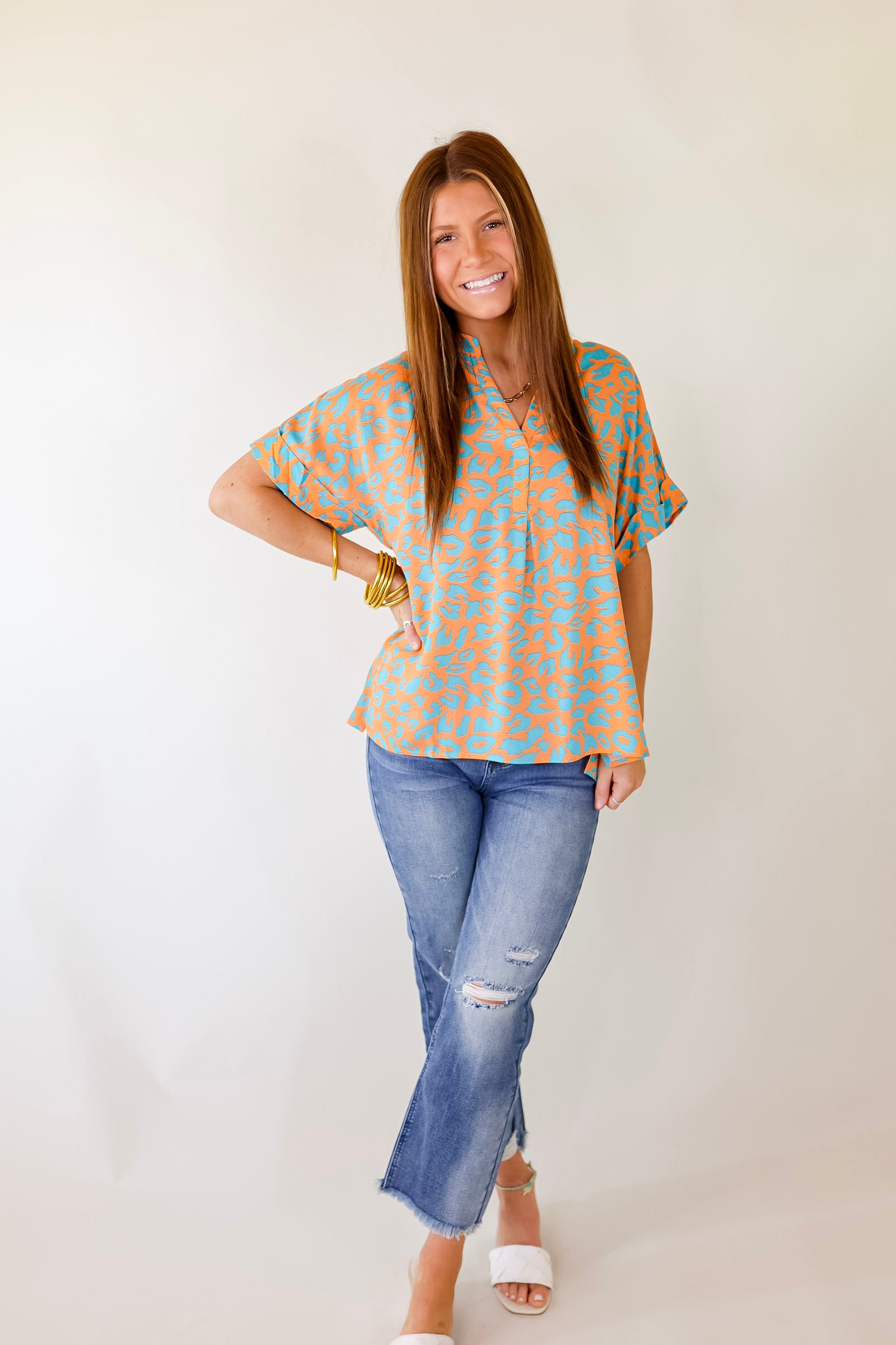 Bold and Beautiful V Neck Teal Leopard Print Top in Orange - Giddy Up Glamour Boutique