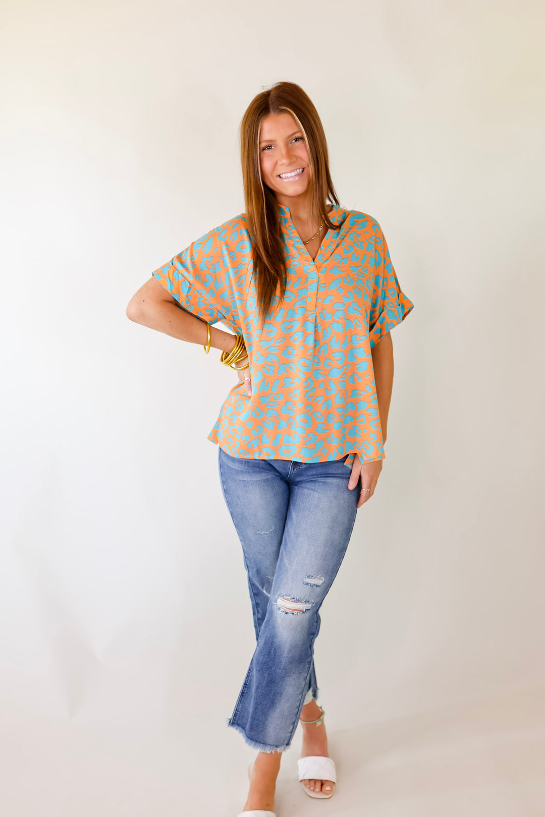 Bold and Beautiful V Neck Teal Leopard Print Top in Orange - Giddy Up Glamour Boutique