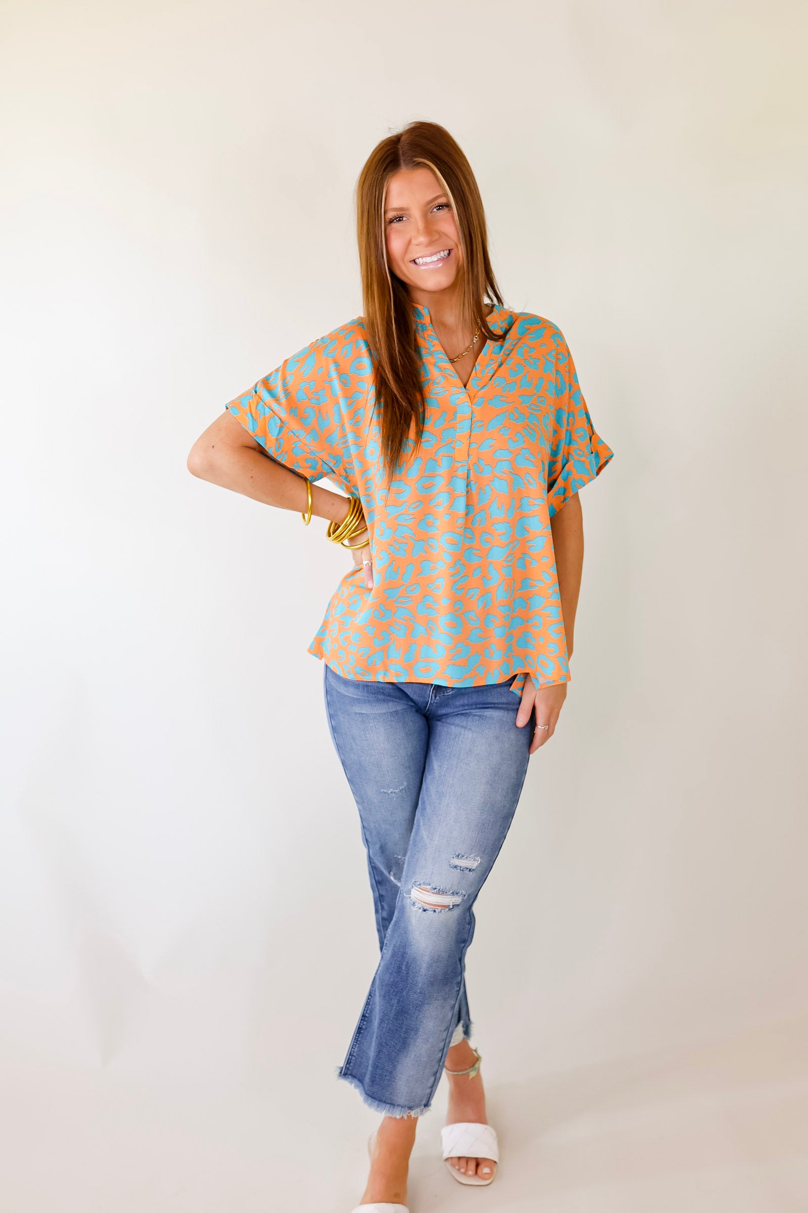 Bold and Beautiful V Neck Teal Leopard Print Top in Orange - Giddy Up Glamour Boutique