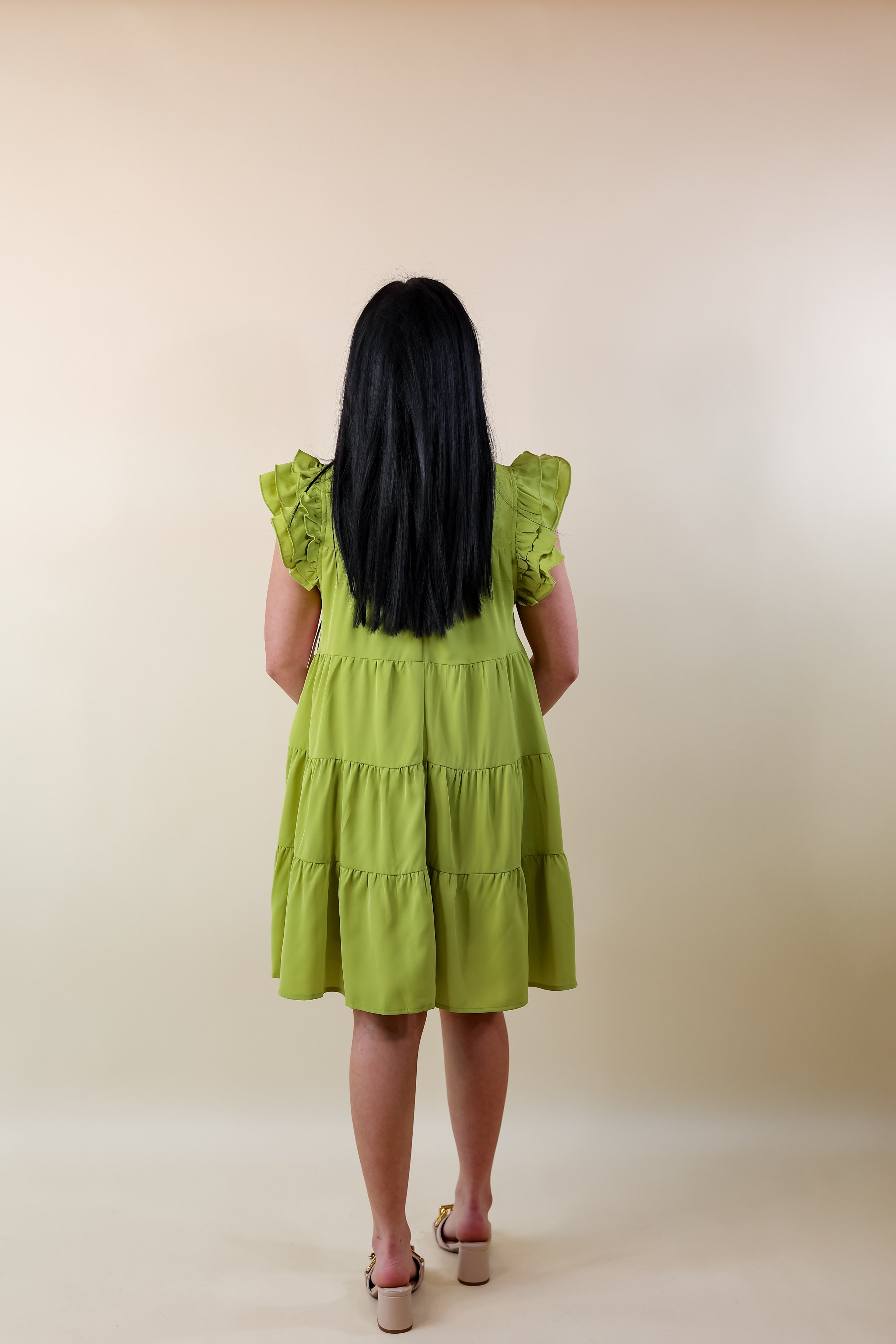 Chic On Scene Ruffle Tiered Dress with Pleated Detailing in Pistachio Green - Giddy Up Glamour Boutique