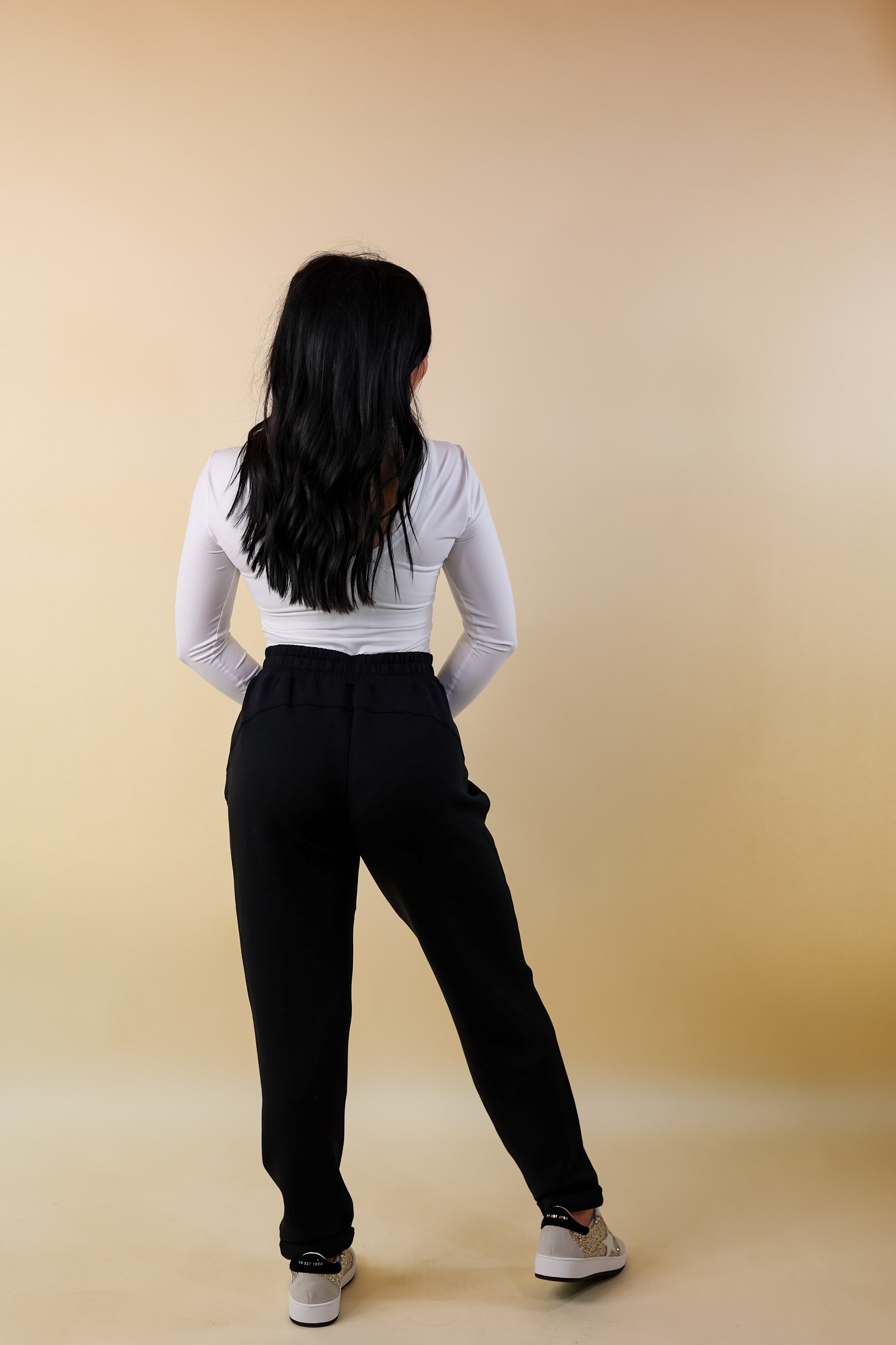 SPANX | AirEssentials Tapered Leg Jogger Sweatpant in Black - Giddy Up Glamour Boutique