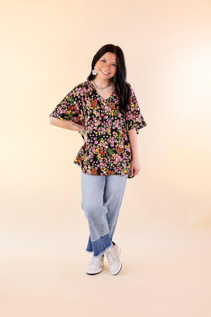 Majestic Moment V Neck Floral Print Poncho Top in Black - Giddy Up Glamour Boutique