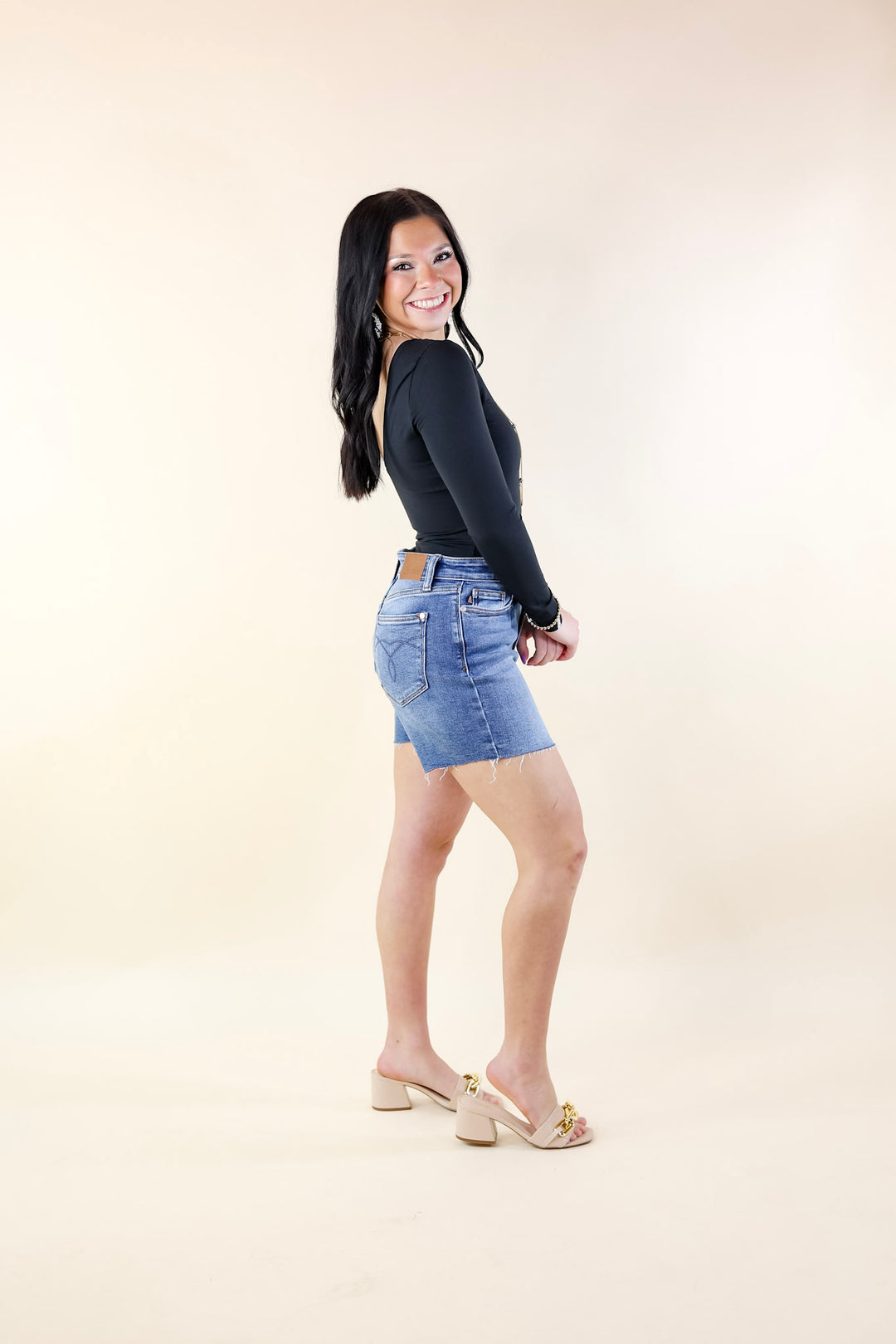 Judy Blue | By Popular Demand Mid Thigh Cut Off Hem Shorts in Light Wash - Giddy Up Glamour Boutique