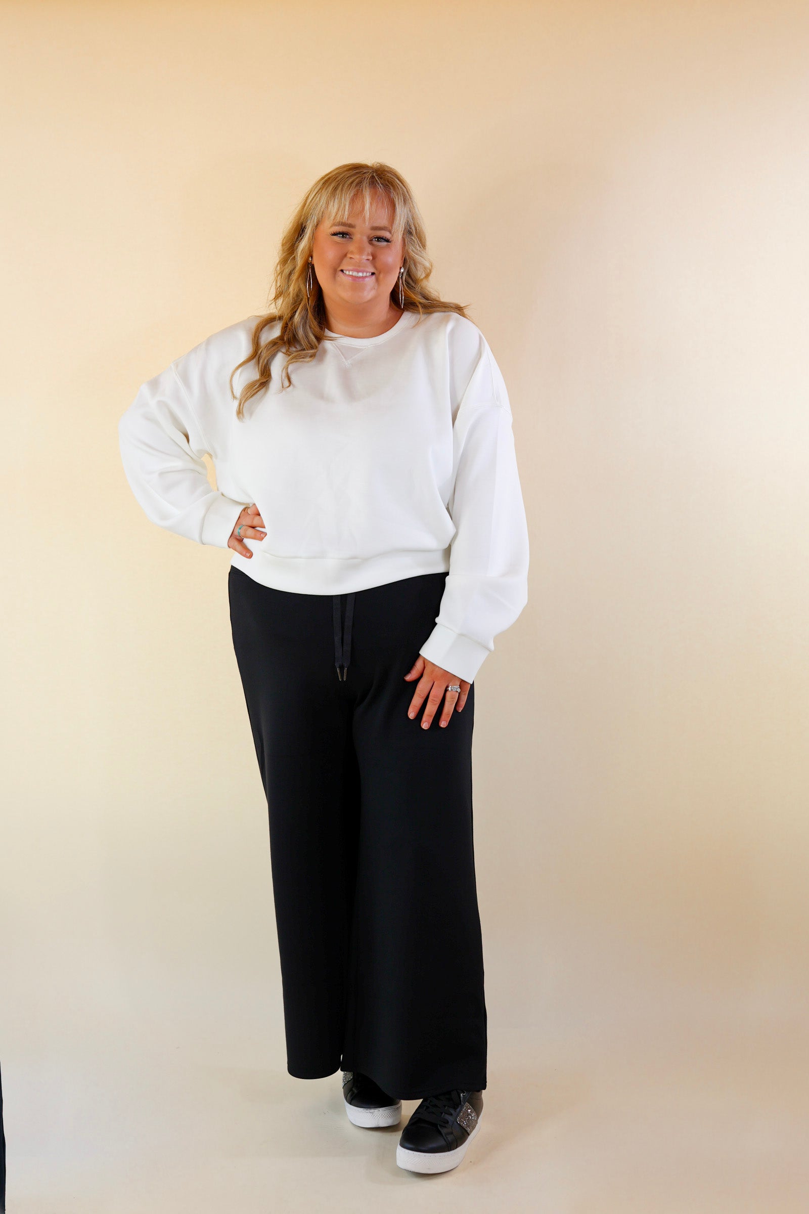 SPANX | AirEssentials Cropped Wide Leg Sweatpants in Black - Giddy Up Glamour Boutique
