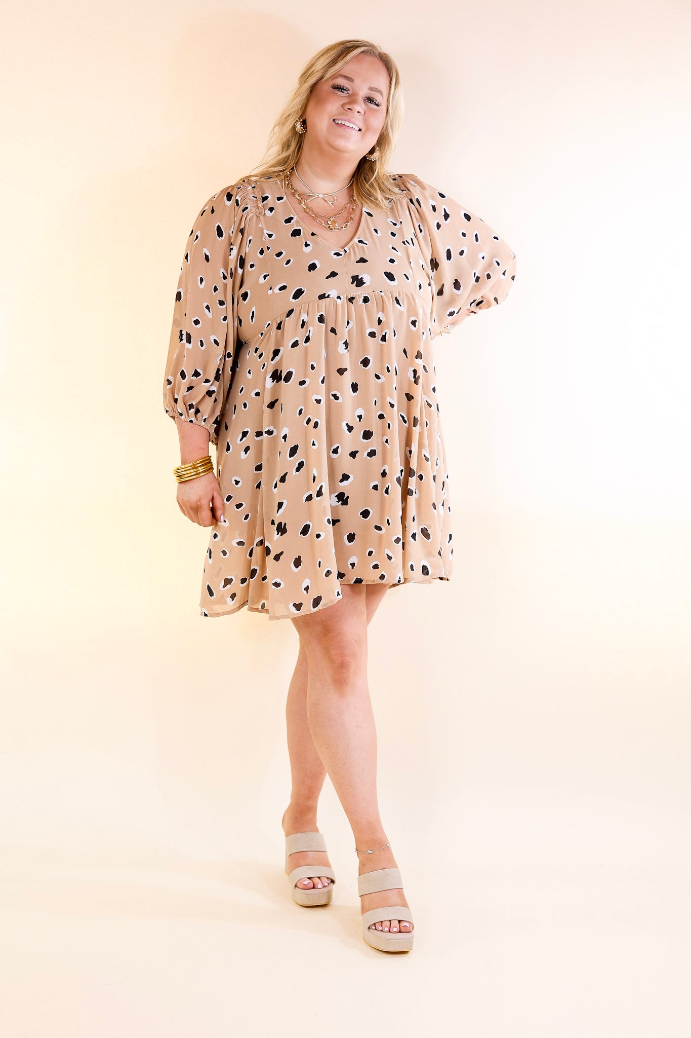 Highlight This Black and Ivory Dotted Dress in Taupe