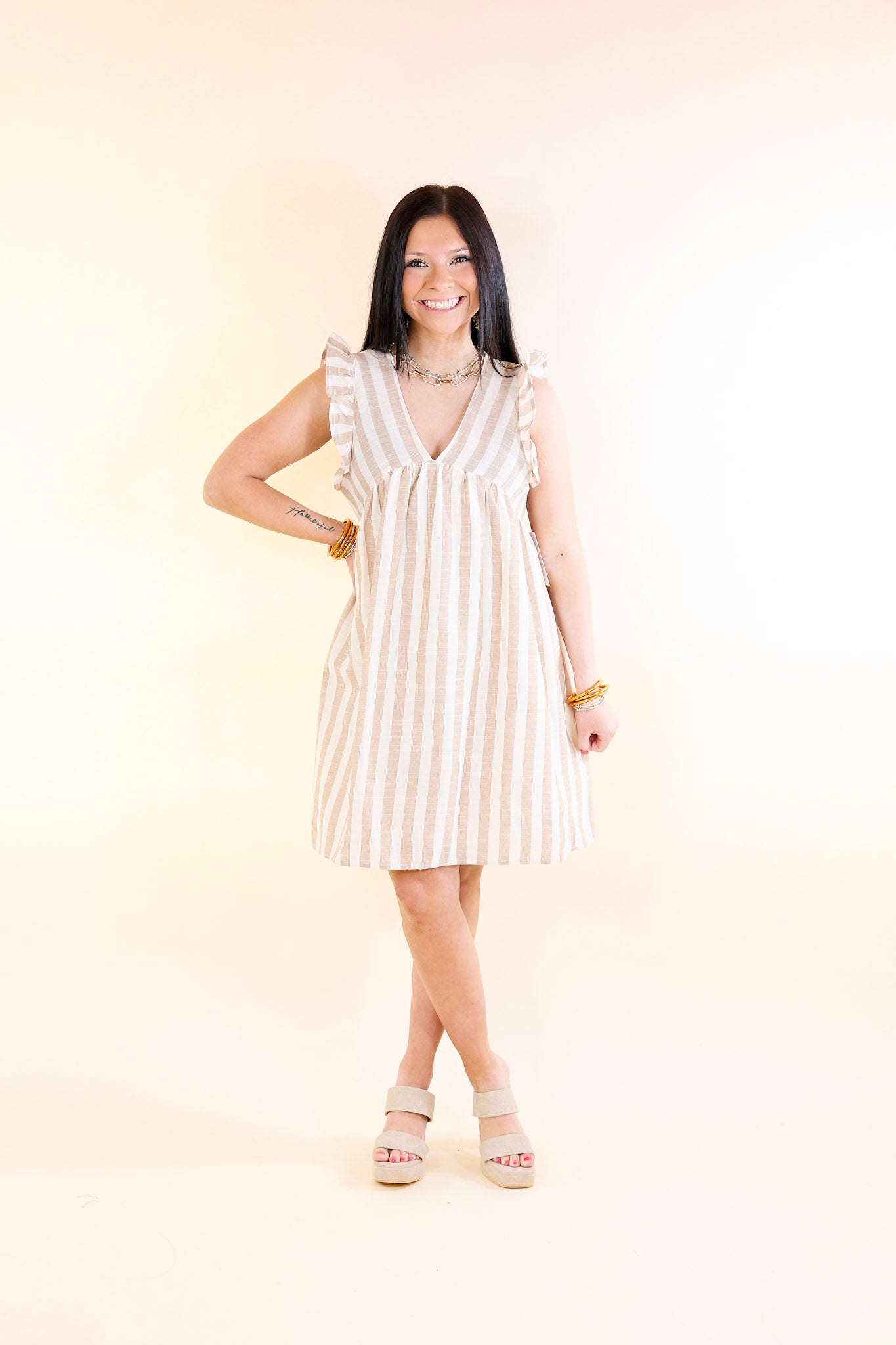 Easy Going Striped Babydoll Dress with Ruffle Cap Sleeves in Taupe