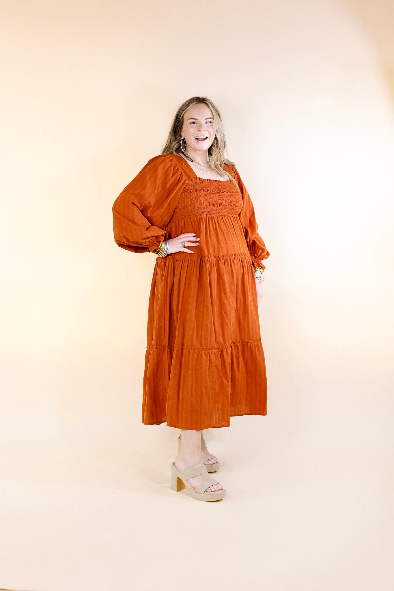 Sunshine And Cider Long Sleeve Tiered Midi Dress in Rust Orange