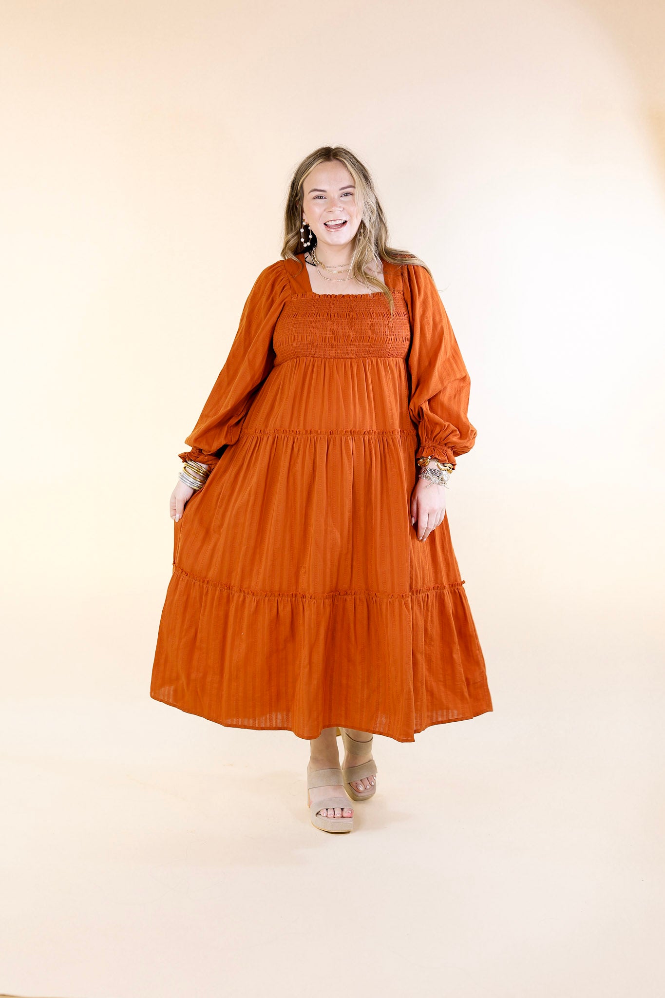 Sunshine And Cider Long Sleeve Tiered Midi Dress in Rust Orange