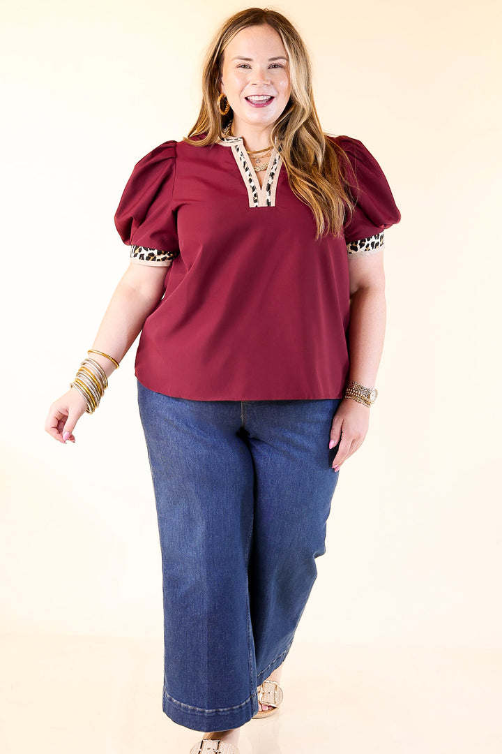 Standout Style V Neck Top with Short Balloon Sleeves and Leopard Print Trim in Maroon