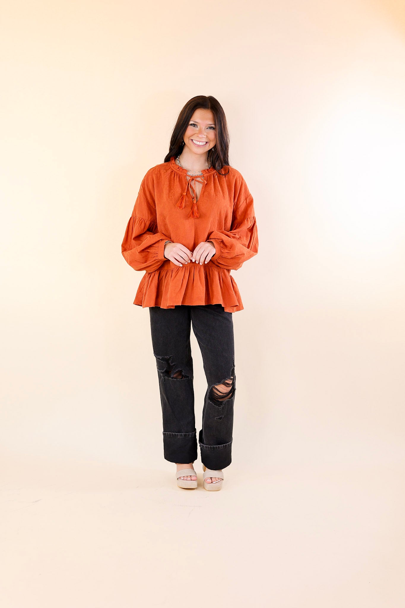 Free Fallin' Textured Long Sleeve Peplum Top with Keyhole Front in Orange