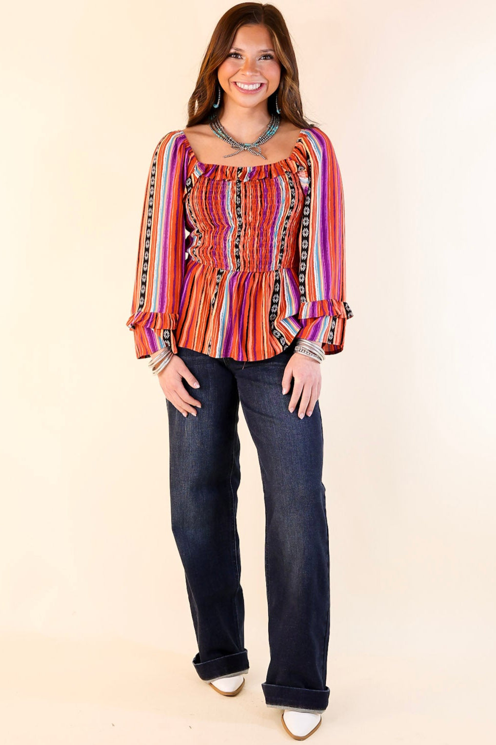 Blissful Break Serape Print Peplum Top with Smocked Bodice in Rust Orange Mix