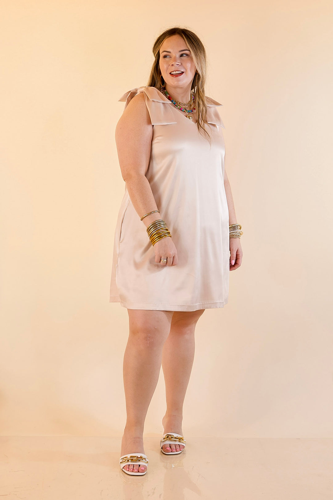 Satin Soirée V Neck Mini Dress with Bow Strap Detailing in Champagne