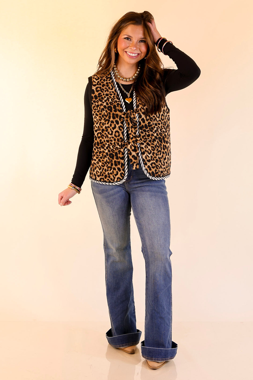 Wildly Chic Quilted Puffer Vest with Stripe Trim and Black Piping in Leopard Print