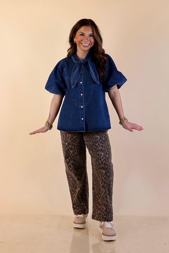 Tie the Moment Denim Pearl Snap Button Front Top with Statement Tie Neckline and Puff Sleeves in Medium Wash