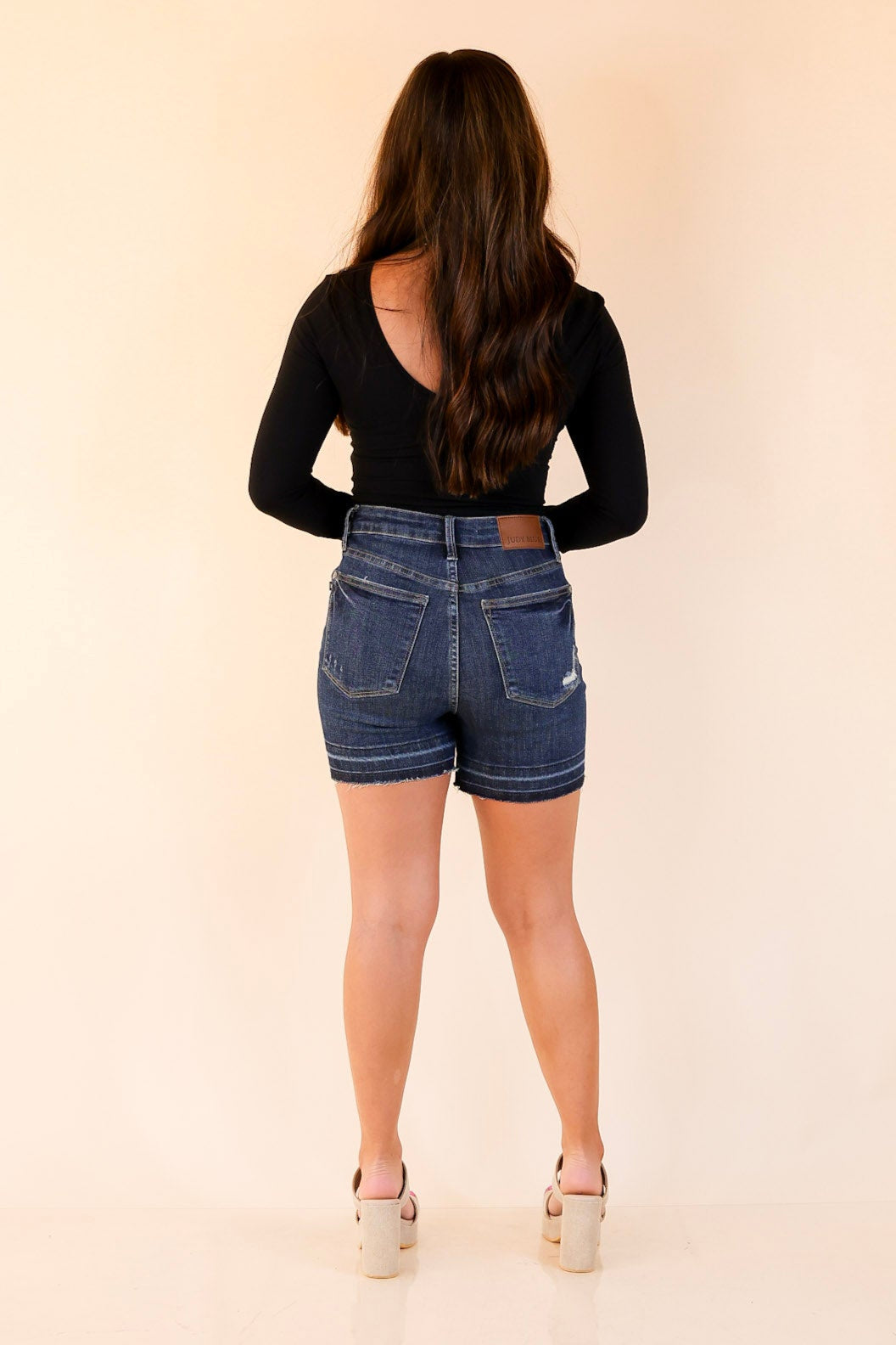 Judy Blue | Highest Honor Tummy Control Denim Shorts With Release Hem in Dark Wash