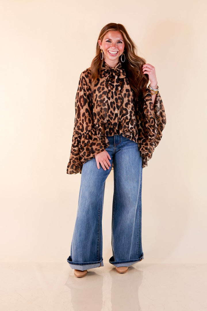 Flirt Factor Long Sleeve Sheer Blouse with Bell Sleeves and Ruffle Detailing and Tie Collar in Leopard Print