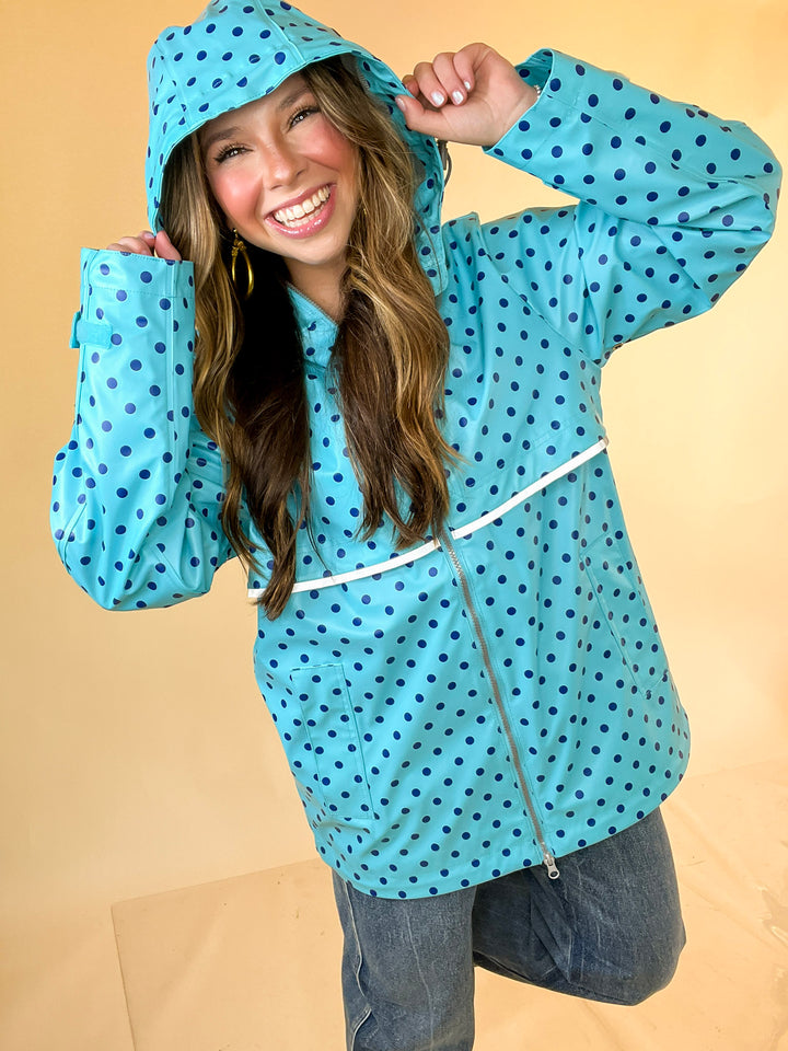 Lulu Mac | Chic Forecast Navy Blue Polka Dot Hooded Rain Jacket in Turquoise Blue
