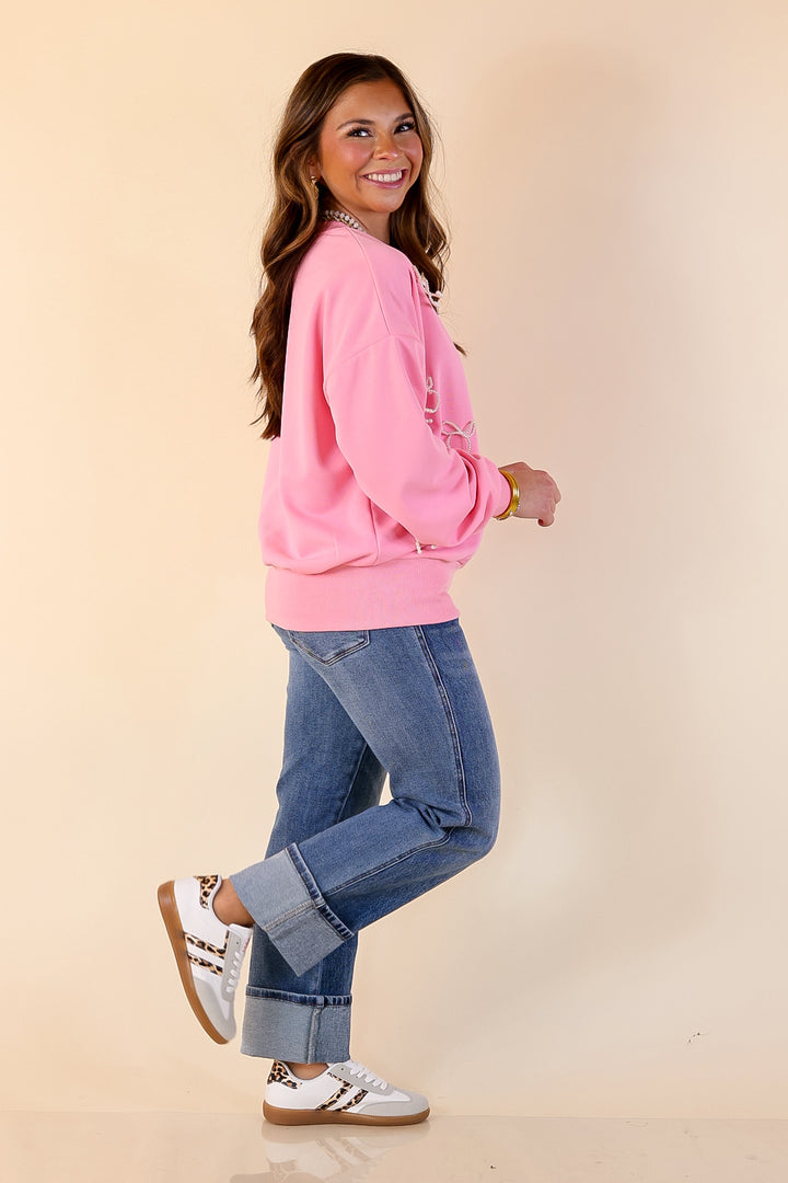 All Tied Up Pearl Bow Detail Long Sleeve Top with Scattered Bow Accents in Pink